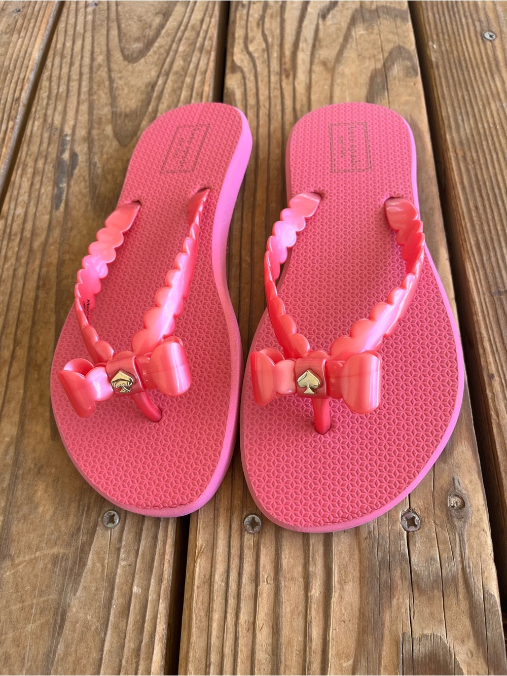 Kate Spade Pink Bow flip flops size 8